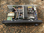 Electronic device with visible wiring and components on a textured surface