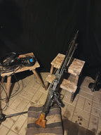 Rifles on wooden stands with a black background