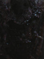 Close-up of dark chocolate with a glossy finish